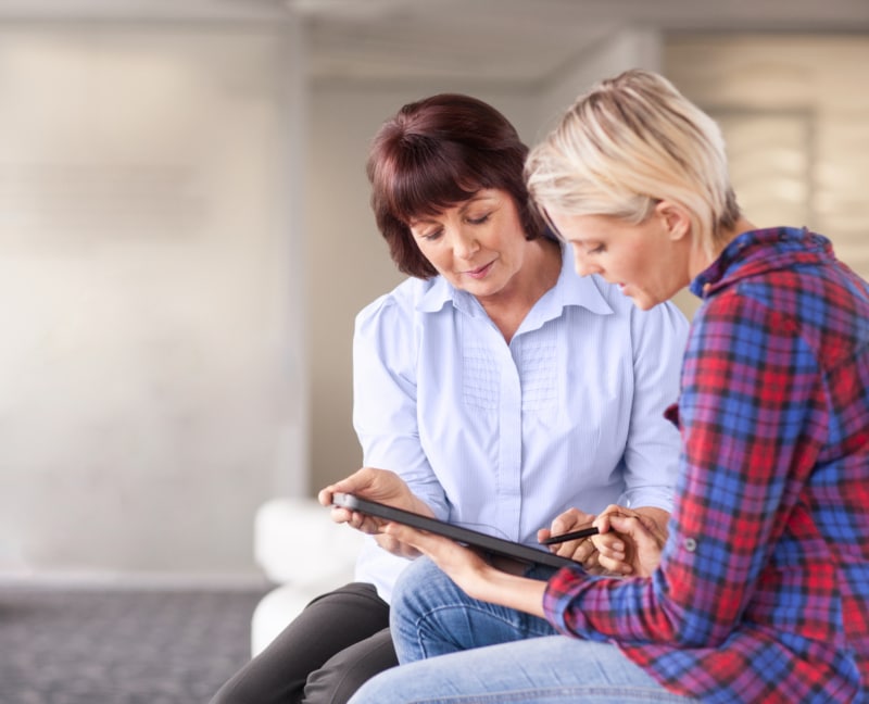 Specialist helping patient with information